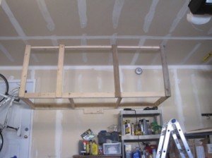 overhead hanging storage base to support beams