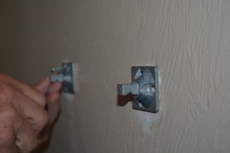 how to fix a broken toilet paper toggle attached