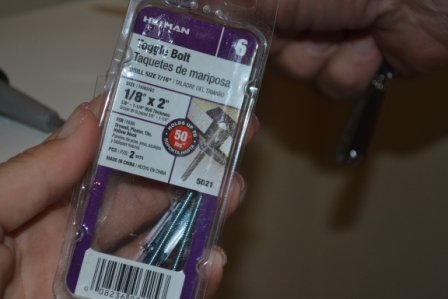 how to fix a broken toilet paper toggles