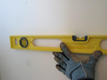 how to build closet storage shelves marking level supports