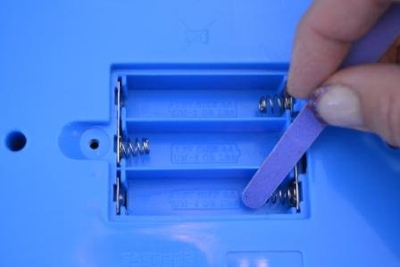 how to clean battery corrosion nail file