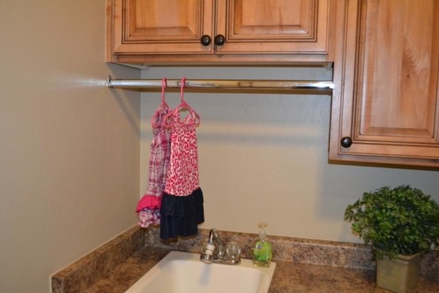 hang a closet rod laundry room